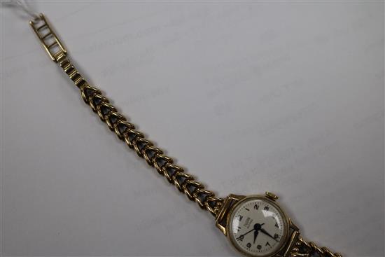 A ladys 1960s 9ct gold Tudor Royal manual wind wrist watch, on a 9ct gold bracelet.